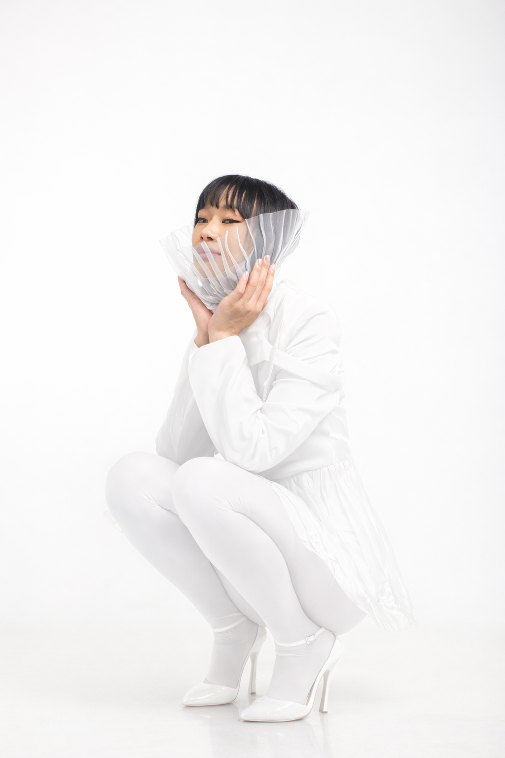 White Peplum Style Jacket